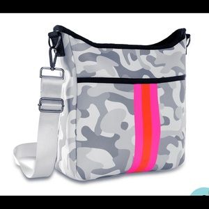 Haute Shore cross body gray camo bag.